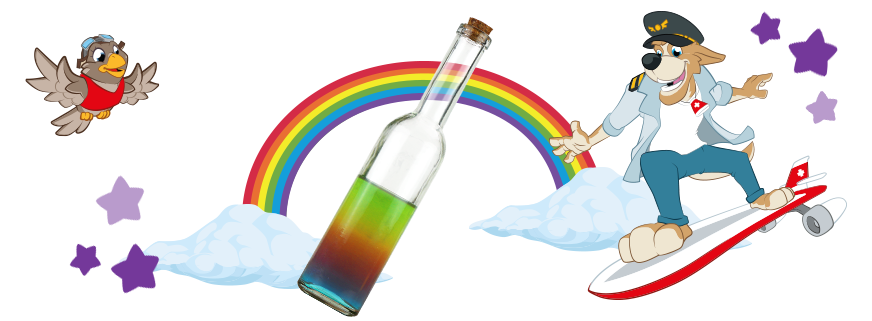 Bernie und Lexi mit einer Flasche, in der Wasser in den Regenbogenfarben geschichtet ist, um das Prinzip der Dichte zu erklären